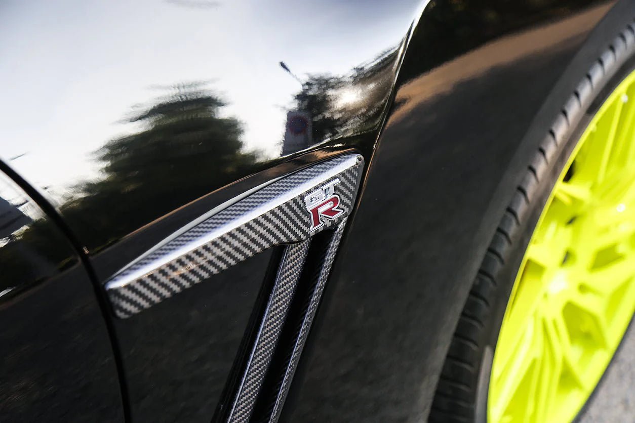2015-2023 Nissan GT-R R35 DBA/EBA Carbon Fiber Fender Logo Covers - Exotics Carbon Design