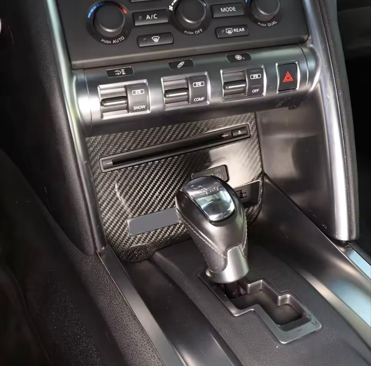 Carbon Fiber Lower Button Panel Trim for Nissan GT-R R35 (2009–2016) - Exotics Carbon Design