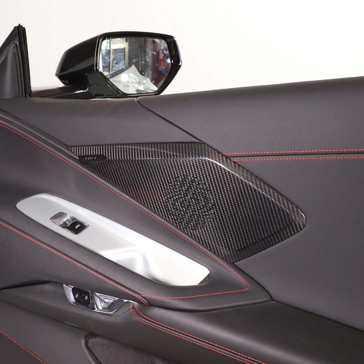 Chevrolet Corvette C8 Carbon Fiber Door Speaker Trim Covers (2020–2026 - Exotics Carbon Design