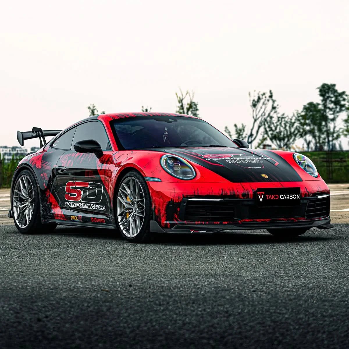 Porsche 992 911 Carrera – TAKD Style Pre-Preg Carbon Fiber Front Splitter - Exotics Carbon Design